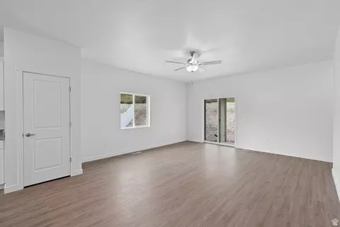 Living - 7247 Bald Eagle Way N, Eagle Mountain, UT 84005 photo 2 of 2