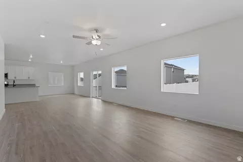Living - 7075 Three Warriors Way N, Eagle Mountain, UT 84005 photo 2 of 2