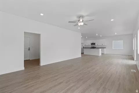 Living - 7075 Three Warriors Way N, Eagle Mountain, UT 84005 photo 1 of 2