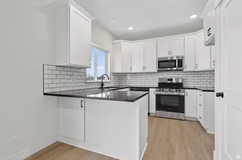 Kitchen - 5767 S Tripp Ln W, Murray, UT 84123 photo 1 of 2