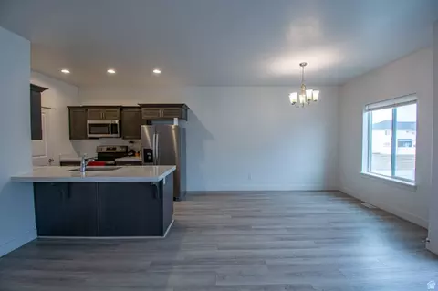 Living - 7030 N Golden Acres Loop, Eagle Mountain, UT 84005 photo 1 of 3
