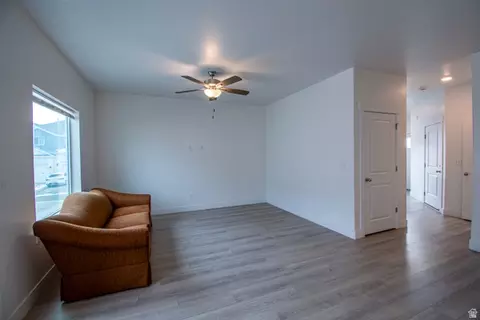 Living - 7030 N Golden Acres Loop, Eagle Mountain, UT 84005 photo 3 of 3