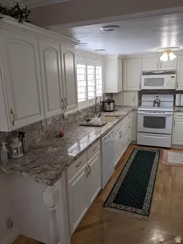 Kitchen - 765 E Three Fountains Cir #28, Murray, UT 84107 photo 1 of 2