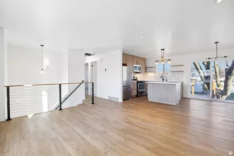 Living - 569 E Aloha Ln, Sandy, UT 84070 photo 4 of 5
