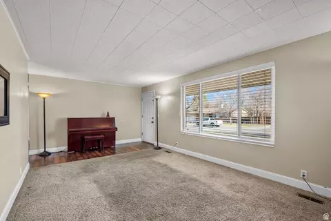 Living - 876 E Chariot Dr, Sandy, UT 84094 photo 2 of 2