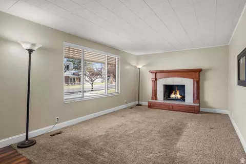 Living - 876 E Chariot Dr, Sandy, UT 84094 photo 1 of 2
