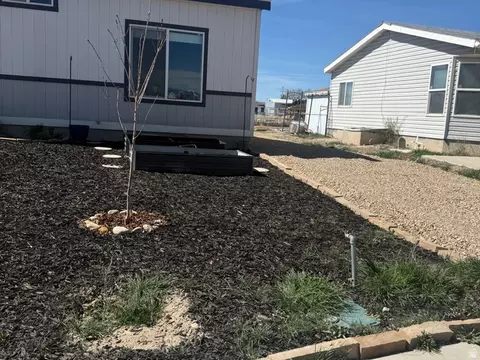 Exterior - 704 E Pine St, Wellington, UT 84542 photo 3 of 5