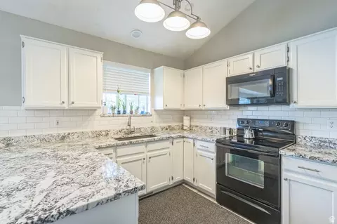 Kitchen - 910 W Brandermill Cv S, Murray, UT 84123 photo 1 of 2
