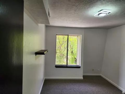 Bedroom - 5402 S Willow Ln E #E, Murray, UT 84107 photo 2 of 4