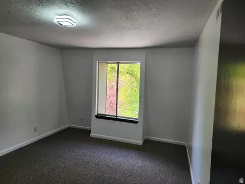 Bedroom - 5402 S Willow Ln E #E, Murray, UT 84107 photo 3 of 4