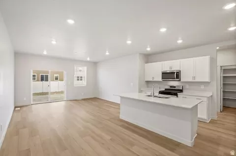 Living - 3434 N Browning St #1514, Eagle Mountain, UT 84005 photo 4 of 6