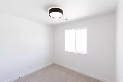 Bedroom - 2988 E Serdar Ln #C16, Eagle Mountain, UT 84005 photo 4 of 6