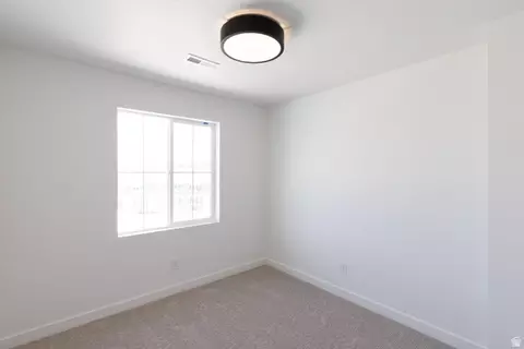 Bedroom - 2988 E Serdar Ln #C16, Eagle Mountain, UT 84005 photo 2 of 6