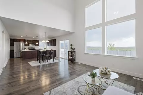 Living - 166 E Craner Peak Dr, Eagle Mountain, UT 84005 photo 2 of 3