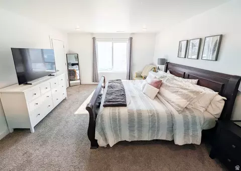 Bedroom - 3893 N Aggie Dr E #104, Eagle Mountain, UT 84005 photo 2 of 3