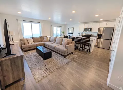Living - 3893 N Aggie Dr E #104, Eagle Mountain, UT 84005 photo 1 of 2