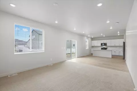 Living - 3452 N Hannah St #1607, Eagle Mountain, UT 84005 photo 3 of 6