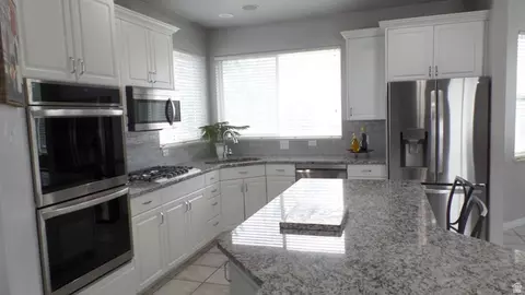 Kitchen - 496 E Spruce Glen Rd, Murray, UT 84107 photo 2 of 4