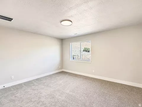 Bedroom - 172 E 4100 St N #130, North Ogden, UT 84414 photo 2 of 6