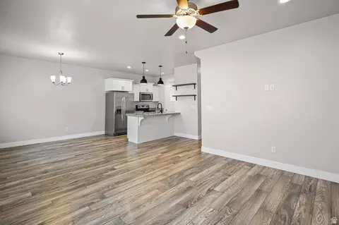 Living - 7549 N Hutch Ln, Eagle Mountain, UT 84005 photo 2 of 3