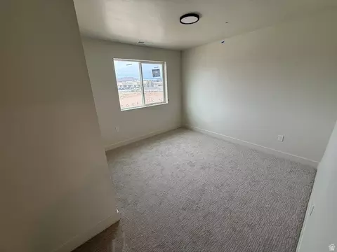 Bedroom - 621 E Ryegrass Dr #311, Eagle Mountain, UT 84005 photo 5 of 9