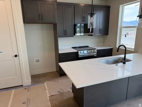 Kitchen - 621 E Ryegrass Dr #311, Eagle Mountain, UT 84005 photo 2 of 4