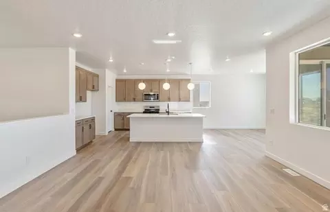 Living - 4945 N Topaz Dr, Eagle Mountain, UT 84005 photo 4 of 6
