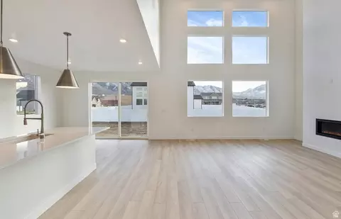 Living - 4875 N Topaz Dr, Eagle Mountain, UT 84005 photo 2 of 3