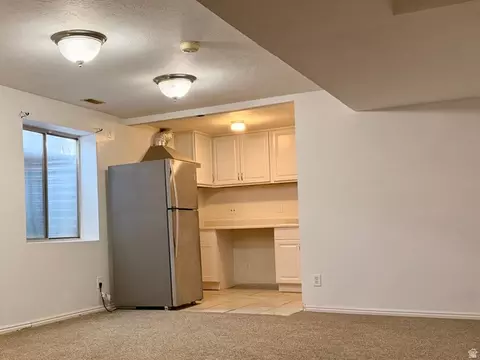 Living - 1528 E Buttercup Dr, Sandy, UT 84092 photo 3 of 3