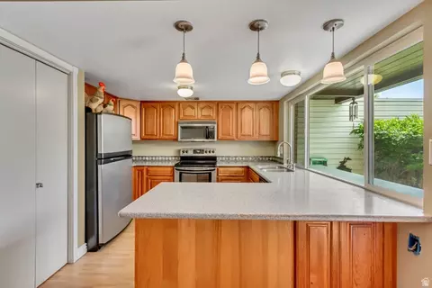 Kitchen - 843 E Three Fountains Dr #263, Murray, UT 84107 photo 2 of 3
