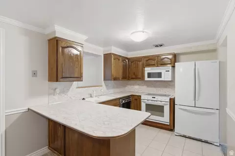 Kitchen - 148 E Tennyson Ave S, Sandy, UT 84070 photo 2 of 3