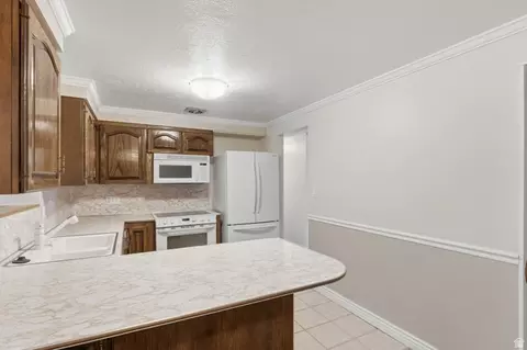 Kitchen - 148 E Tennyson Ave S, Sandy, UT 84070 photo 3 of 3