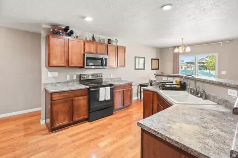 Kitchen - 1101 E Searle Ln N, Eagle Mountain, UT 84005 photo 2 of 4