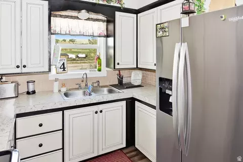 Kitchen - 90 S Railroad Ave, Arimo, ID 83214 photo 3 of 4