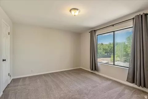Bedroom - 7327 S Springcrest Ct # 30, Midvale, UT 84047 photo 2 of 9