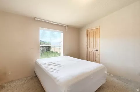 Bedroom - 14908 N Deep Creek Rd, Lapoint, UT 84039 photo 2 of 5