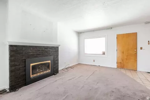 Living - 59 E Pinehurst Ave N, Tooele, UT 84074 photo 2 of 2