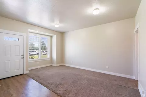 Living - 1754 E Skyline Dr #K2, Eagle Mountain, UT 84005 photo 2 of 3