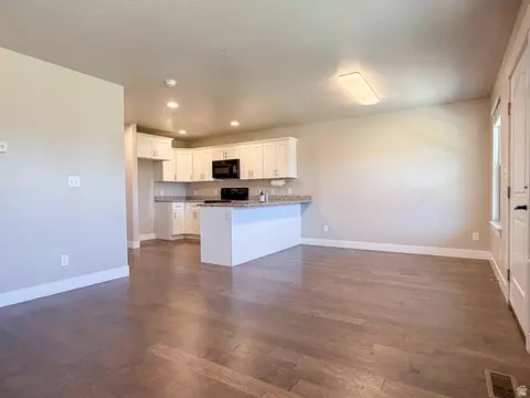 Living - 1848 E American Way #11, Eagle Mountain, UT 84005 photo 2 of 2