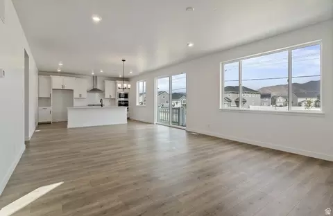 Living - 5394 N Saddle Stone Dr #515, Eagle Mountain, UT 84005 photo 4 of 5
