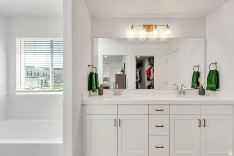 Bath - 4569 E Fall Harvest Rd, Eagle Mountain, UT 84005 photo 2 of 6