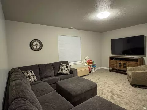 Living - 3556 E Royal Dornoch Dr, Eagle Mountain, UT 84005 photo 3 of 4