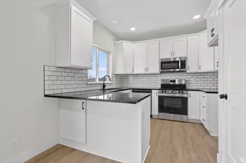 Kitchen - 5803 S Tripp Ln W, Murray, UT 84123 photo 1 of 2