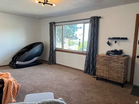 Living - 580 Simoron Dr, Ogden, UT 84405 photo 1 of 2