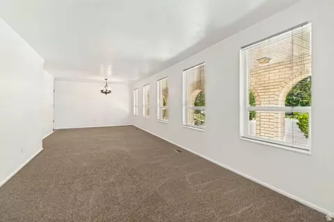 Living - 1602 Nicklaus Cir, Sandy, UT 84092 photo 5 of 8