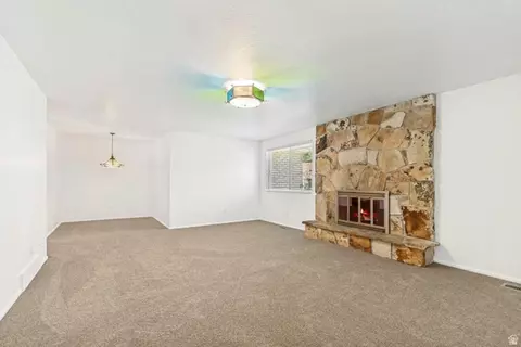 Living - 1602 Nicklaus Cir, Sandy, UT 84092 photo 3 of 8