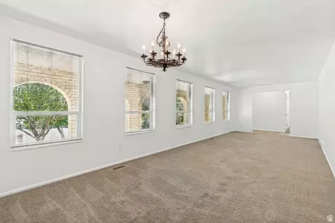 Living - 1602 Nicklaus Cir, Sandy, UT 84092 photo 4 of 8