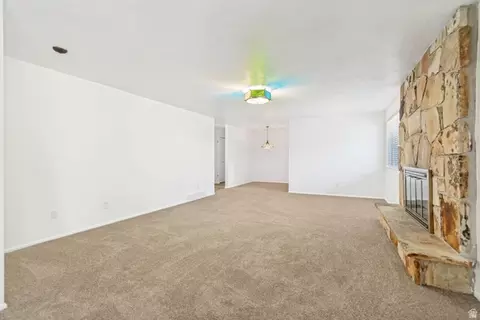 Living - 1602 Nicklaus Cir, Sandy, UT 84092 photo 2 of 8