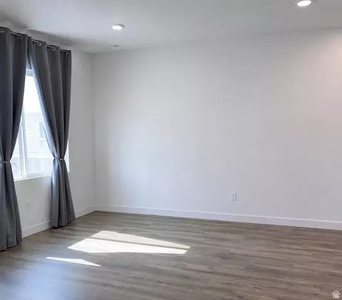 Living - 3928 Cougar Ln, Eagle Mountain, UT 84005 photo 2 of 3