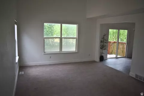 Living - 3327 E Windhover Rd, Eagle Mountain, UT 84005 photo 2 of 5